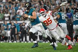 Jaguars defense tackling a Chiefs running back